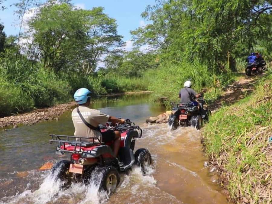 KhaoLak:ATV, ZipLine, & Rafting Adventure Monkey Cave Temple - After rafting: photo stops, a walk, and the chance to cool off