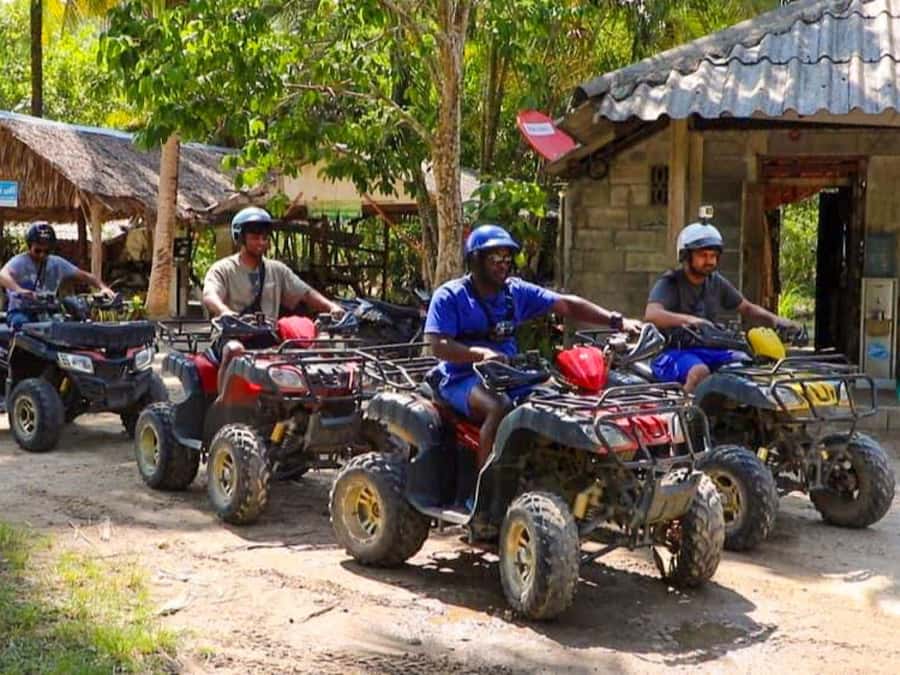 KhaoLak:ATV, ZipLine, & Rafting Adventure Monkey Cave Temple - Thai lunch buffet with seasonal fruit and cold drinks