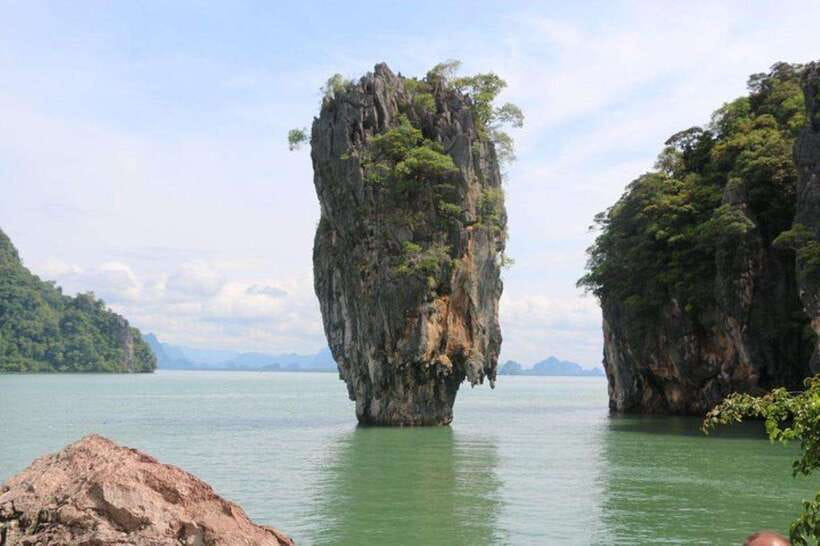 Khaolak: Phang Nga Bay, Tapu Island, and Panyi Village Tour - Panyi Village on stilts: culture, markets, and the heat reality check