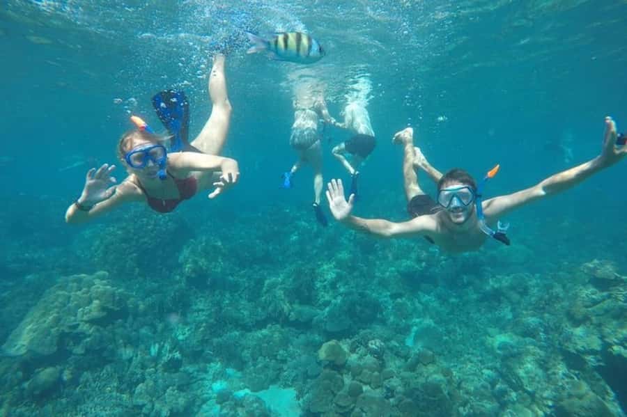 Ko Lanta: Early Bird the Emerald Caves and Koh Kradan Tour - Koh Kradan beach time, with the day-tripper problem handled