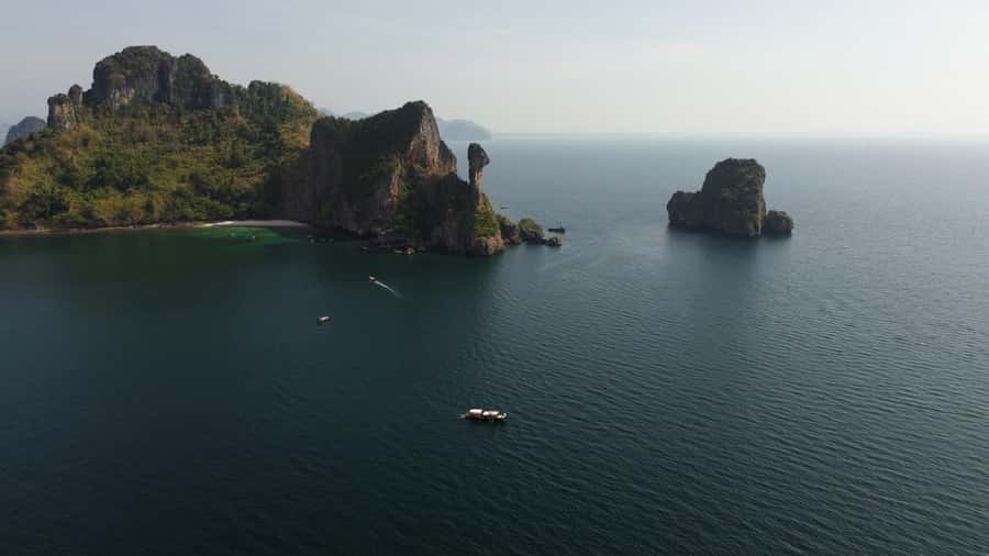 Krabi: 4 Islands Day Tour by Speedboat or Longtail Boat - Chicken Island and the snorkeling stop: quirky rock, real water time