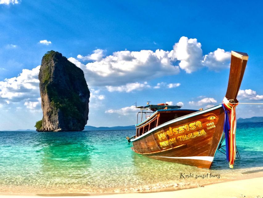 Krabi: 4 Islands Snorkeling Tour by Longtail Boat - Phra Nang Cave Beach: walking the sand with limestone drama