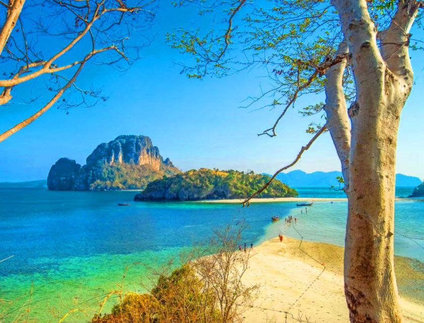 Krabi: 4 Islands Sunset Longtail Boat Tour with BBQ Dinner - Railay and the first snorkeling session: where the color starts