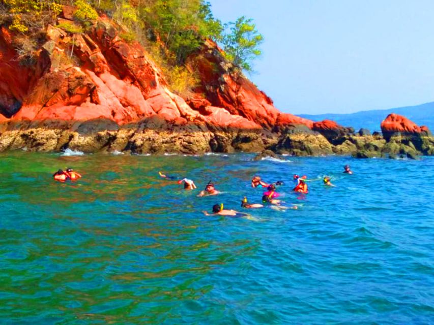 Krabi: 4 Islands Sunset Longtail Boat Tour with BBQ Dinner - Chicken Island and the iconic rock: snorkeling plus a real swim beach