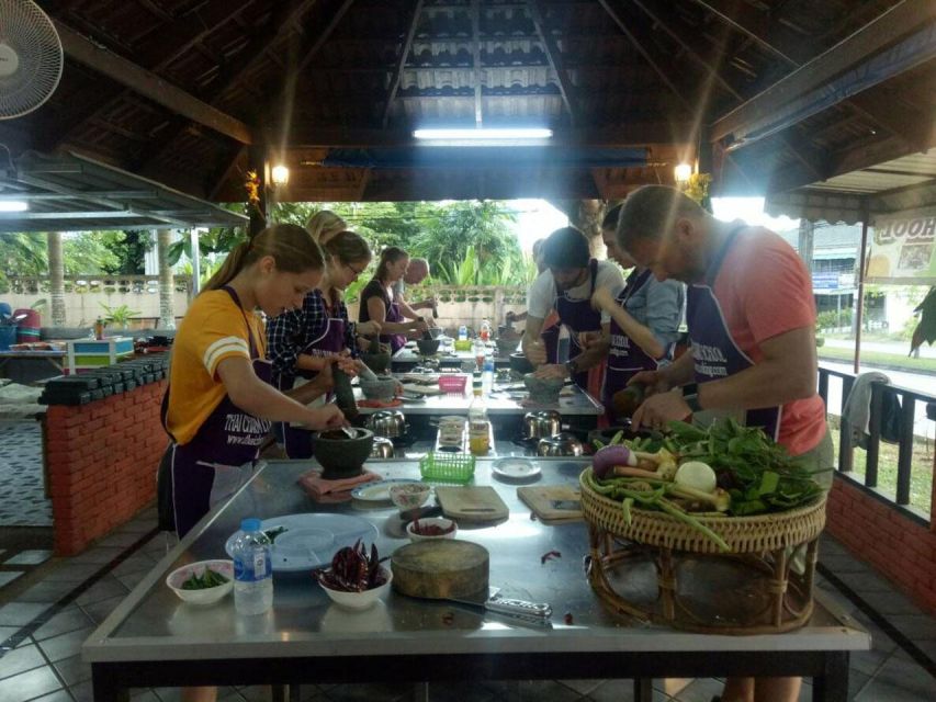 Krabi: Cooking Class at Thai Charm Cooking School with Meal - Choosing your dishes from the menu: soups, stir-fries, salads, curries