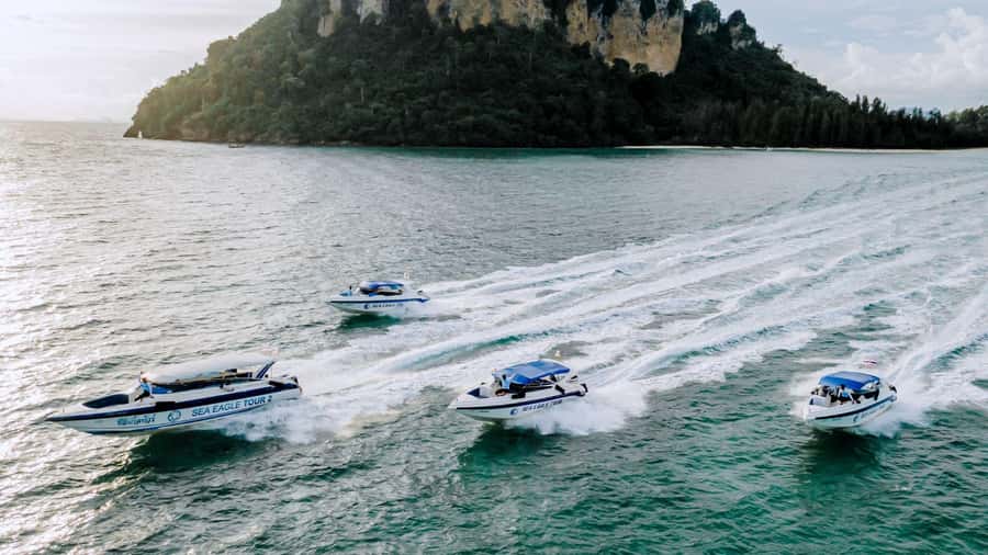 Krabi: Phi Phi Early Bird & 4 Island by Speedboat with Lunch - The boat day, reality check: pace, safety, and group size on Sea Eagle Tour