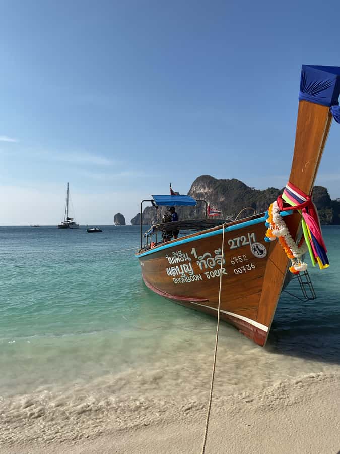 Krabi: Phi Phi Islands Longtail Boat Tour with Sunset - Snorkeling in clear lagoon waters: gear is included for a reason