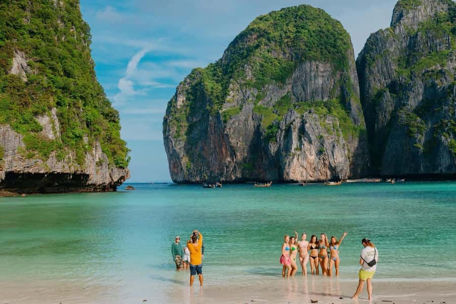 Krabi: Phi Phi Islands Longtail Boat Tour with Sunset - Loh Samah Bay to Maya Bay: classic scenery, plus possible park fees