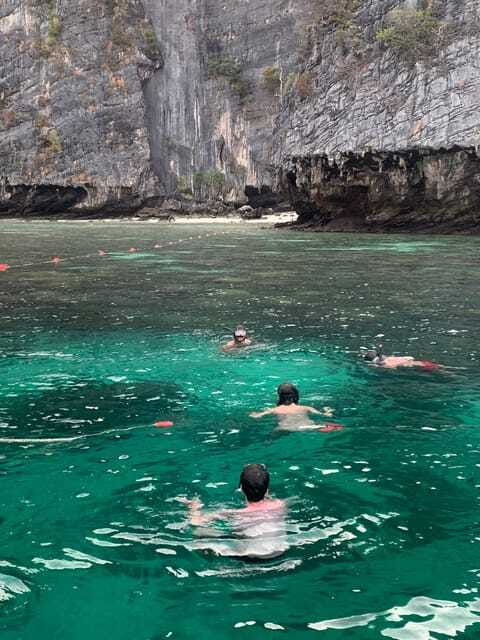 Krabi: Phi Phi Islands Longtail Boat Tour with Sunset - Bioluminescent plankton snorkeling: what to expect without guarantees