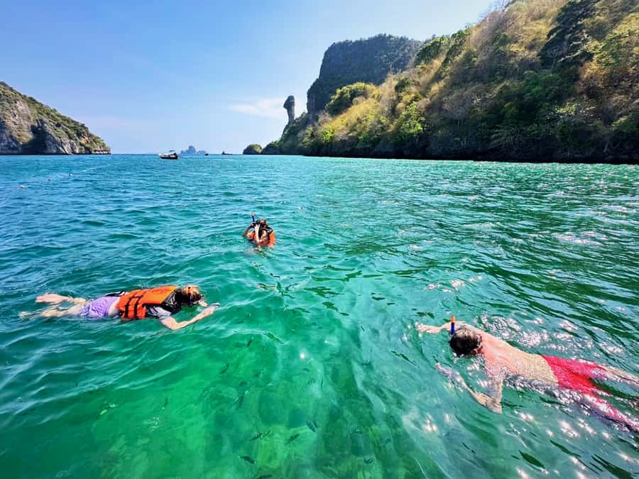 Krabi: Private 4 Islands Longtail Boat Tour With Cave Visit - Chicken Island snorkeling: coral and fish, with a focused vibe