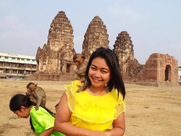 Lopburi Monkey Temple & Ayutthaya Old City Tour From Bangkok - Wat Mahathat and the famous Buddha head in roots