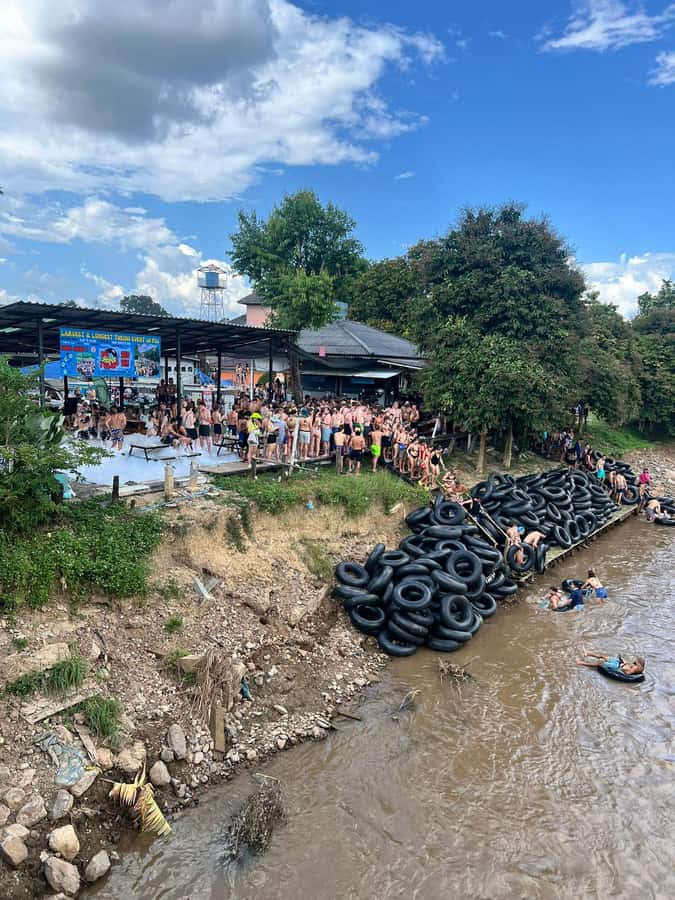 Pai: Jungle Tubing River Excursion with DJs & Foam Party - Entering the Pai River routine: launch, safety brief, and warm-up drinks