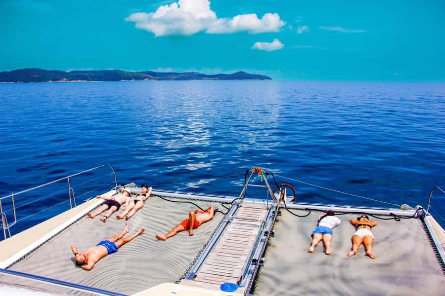 Pattaya: Exclusive 3-Island Catamaran Tour with Buffet Lunch - Koh Rin: crystal-clear water with a protected shore