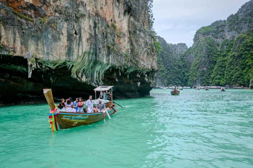 Phi Phi: 7 Island Longtail Boat Snorkeling Tour with Sunset - Maya Bay and Bamboo Island: famous beaches plus a cash-only fee