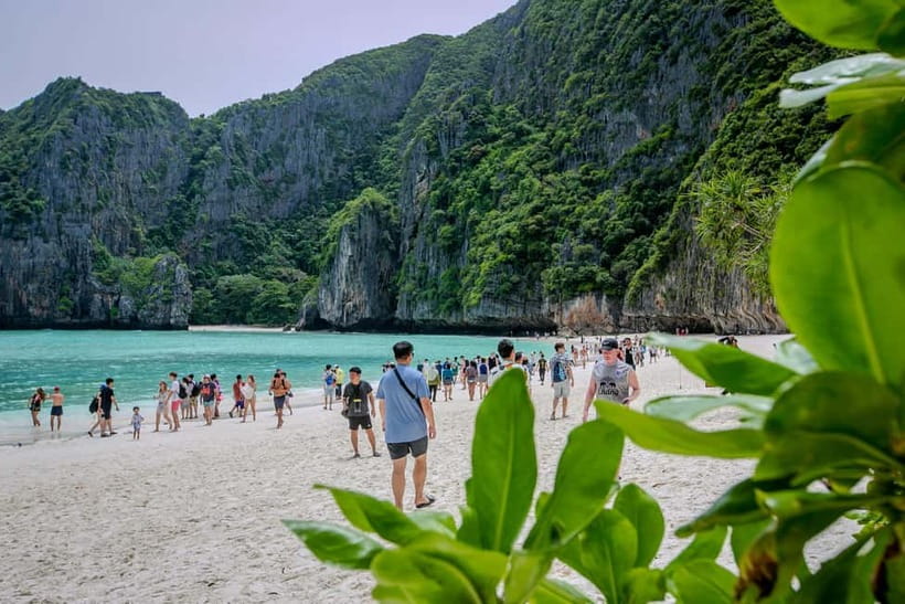 Phi Phi: 7 Island Longtail Boat Snorkeling Tour with Sunset - Getting started at the Marlin Statue, and how the 8 hours flow