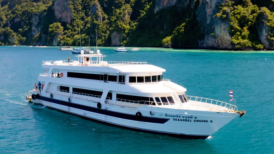 Phi Phi Island Highlights: Cruise, Snorkel & Buffet Lunch - Pileh Lagoon and Viking Cave: Limestone Drama Over Quiet Beach Time
