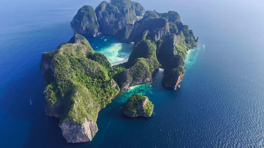 Phi Phi Islands: 2 Days, 1 Night Trip with Activities - Phuket Pickup, Pier Transfer, and Speedboat Time