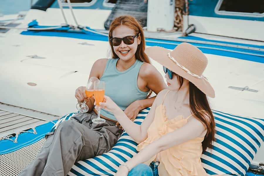 Phuket: Coral and Racha lslands Catamaran Tour with Lunch - From hotel pickup to the first islands: how the day actually moves