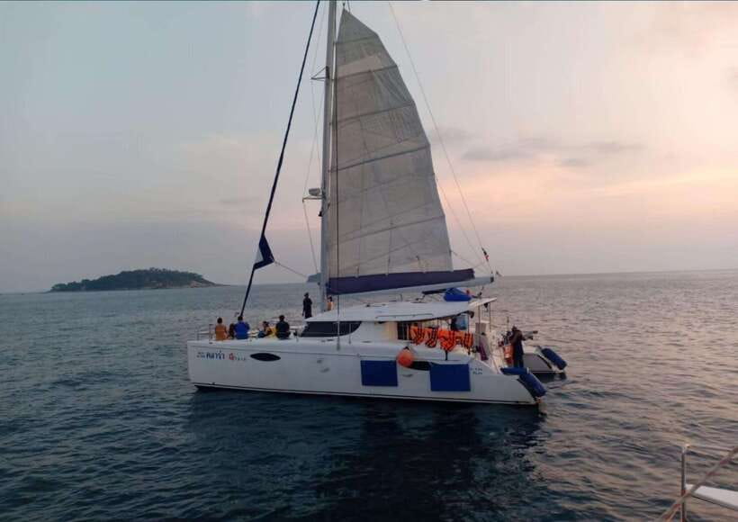 Phuket: Coral Island Catamaran Cruise with Sunset Dinner - From Phuket pickup to Chalong Pier, the day starts easy