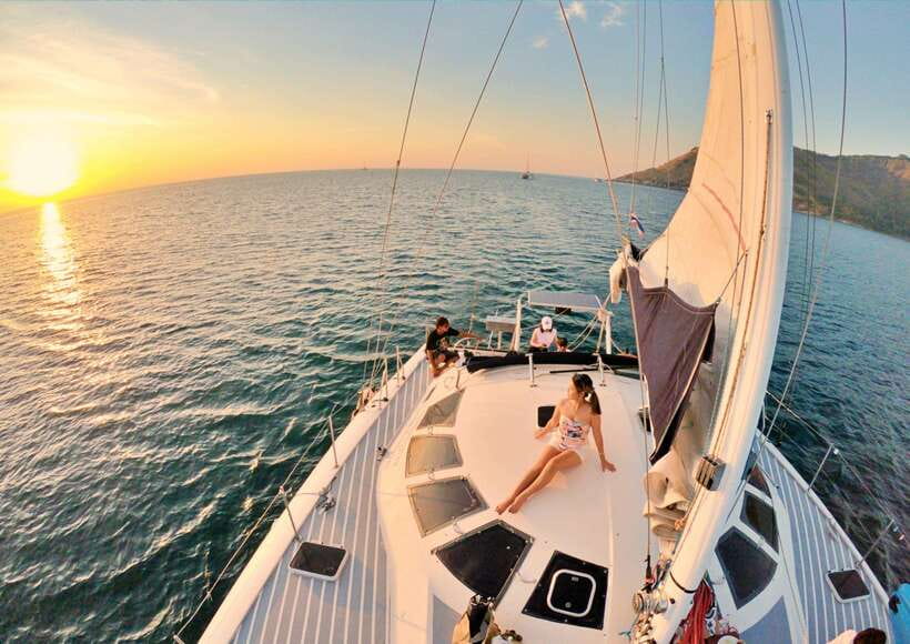 Phuket: Coral Island Catamaran Cruise with Sunset Dinner - The catamaran ride: comfort, crowding, and what to do on board
