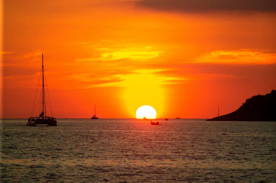 Phuket: Coral Island Day Trip and Sunset Dinner by Catamaran - Kahung Beach on Coral Island: where the real hangout time happens