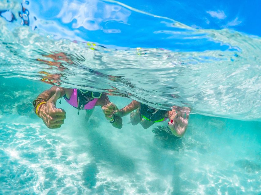 Phuket: Coral & Racha Islands Day Trip By Speedboat - Coral Island (Kahung Beach): lunch at Kahung Beach and a slower island rhythm