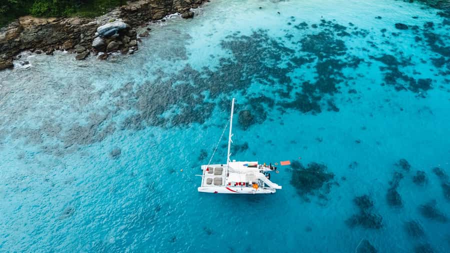 Phuket: Coral, Racha, Promthep Island Catamaran Trip & Lunch - Maiton Private Island: Photo Stop, Swimming, and a Dolphin Watching Window