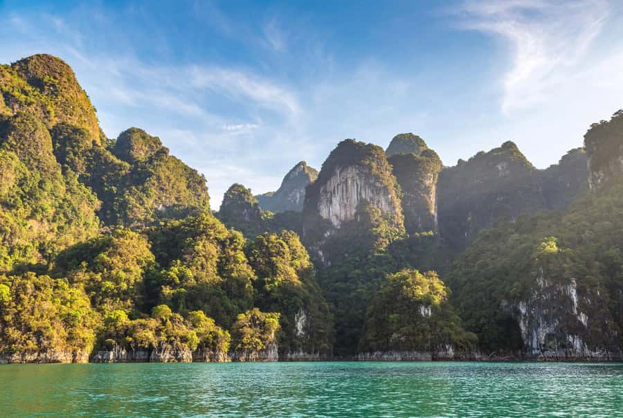 Phuket: Hong Island Lagoon and Lao Lading Island Speed Boat - Hong Island: Limestone Cliffs and Quiet Beach Moments