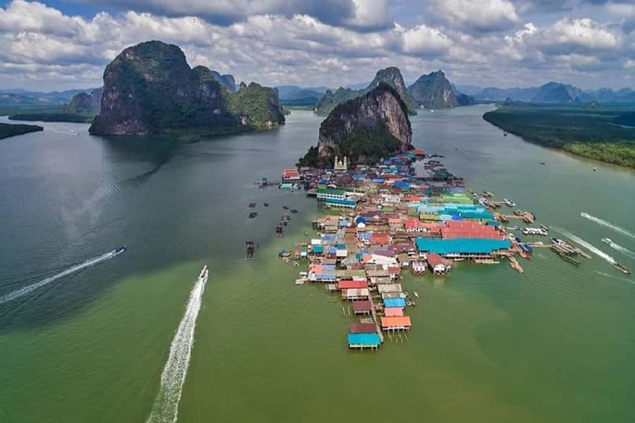 Phuket: James Bond Island and Phang Nga Bay Tour by Boat - Fishing village stop: a quieter moment after the big scenery