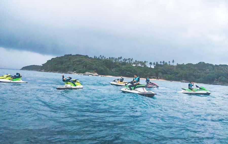 Phuket: Jet Ski Tour Patong Beach with 9 Check-in Points - Where It Starts: Patong Bus Station and the Yellow Tent