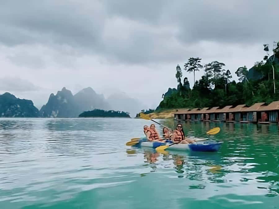 Phuket: Khao Sok and Cheow Lan Lake Tour with Lunch - Cheow Lan Lake by Long-Tail Boat: Limestone Cliffs and Wet Weather Reality