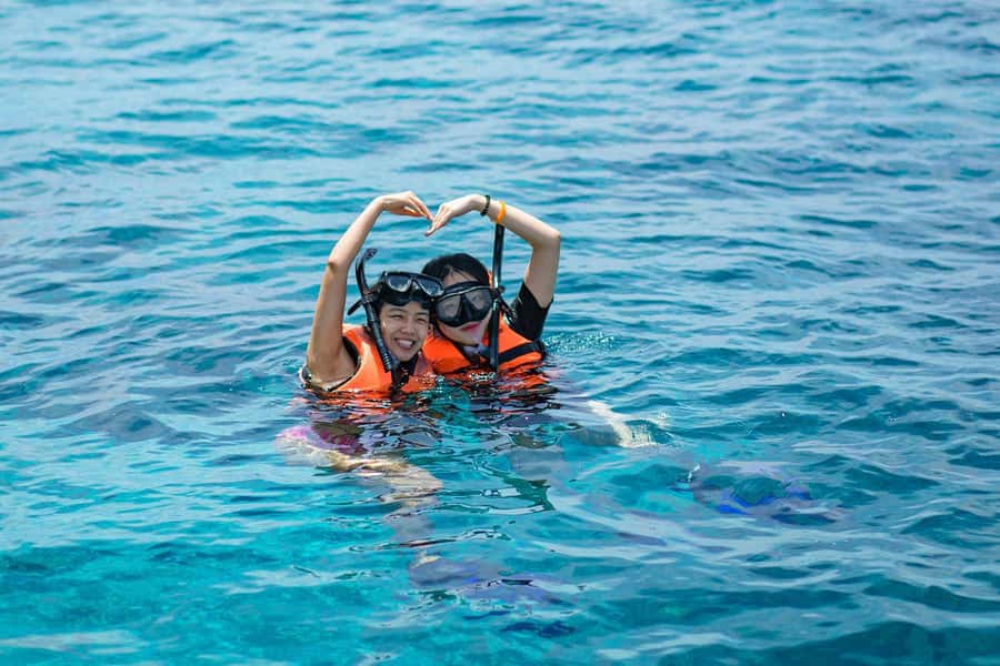Phuket: Maiton, Coral, and Racha Island Snorkeling Trip - Lunch Over Buanghai Bay and the Midday Reset