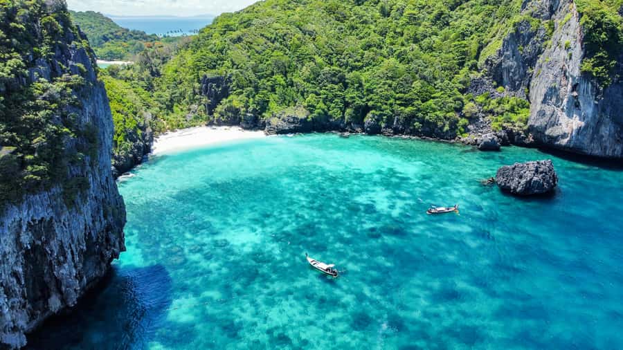 Phuket: Maya, Phi Phi, and Bamboo Island with Buffet Lunch - Pileh Lagoon: emerald water and limestone walls