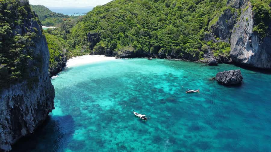 Phuket: Phi Phi, Bamboo & Maithon by Premium Speed Catamaran - Maiton Island sunset, dolphins if lucky, and onboard BBQ