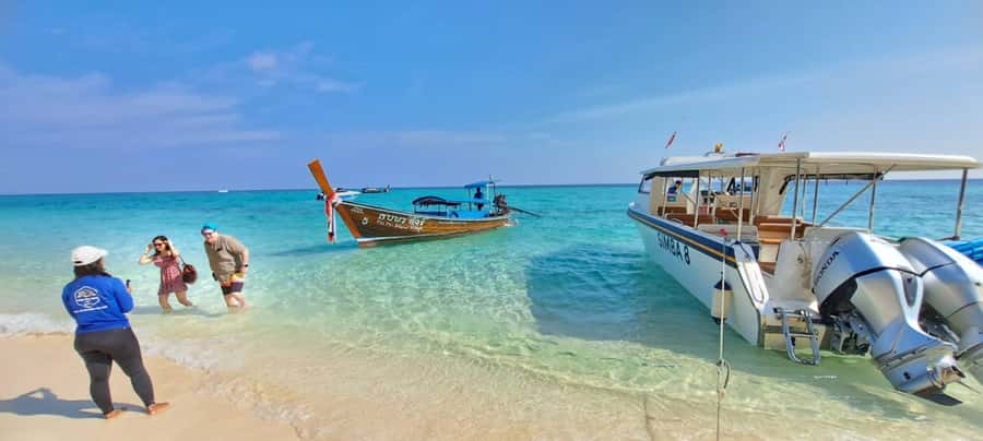 Phuket: Phi Phi Island Sunrise Group Speedboat Tour - Pileh Lagoon: swim time with limestone drama (and currents to respect)