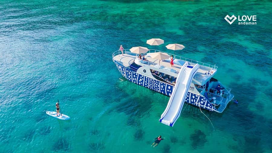 Phuket: Phi Phi Maiton Island Sunset Premium Catamaran Tour - Maiton Island Water Play, Slide Time, and Paddleboarding