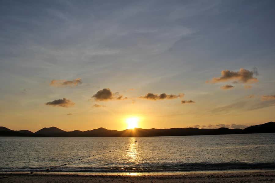 Phuket: Phi Phi Sunrise Boat Tour to Bamboo and Khai Island - Khai Nai Island sunrise: breakfast, shallow turquoise, and easy first swims