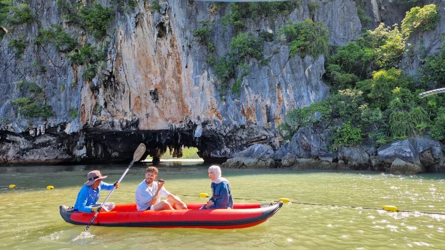Phuket: Private Tour to James Bond, Ko Panyi & Samet Nangshe - Wat Suwan Khuha Cave Temple: the reclining Buddha, and dress rules that matter
