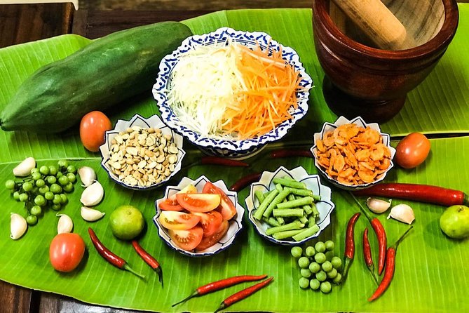 Pink Chili - Thai Cooking Class and Market Tour in Bangkok - Learning Thai wok skills, not just copying recipes