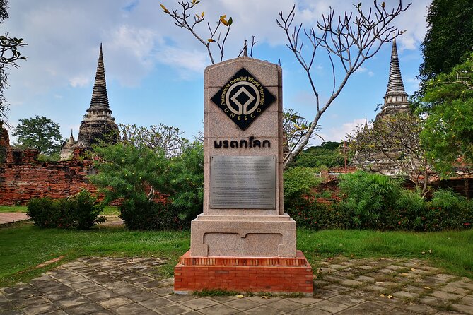 Private Excursion to Ayutthaya, UNESCO World Heritage site with Boat Tour - Wat Mahathat: the Buddha head in the tree roots (don’t miss this)