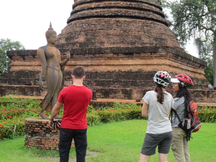 Sukhothai: Historical Park & Countryside Cycling Tour - Entering Sukhothai’s Eastern Gate, temple craft, and religion