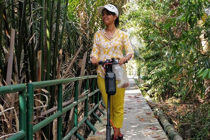Take a E-Scooter Ride in Bangkok's Jungle - Getting started at Wat Khlong Toei Nok Pier, then the ferry switch